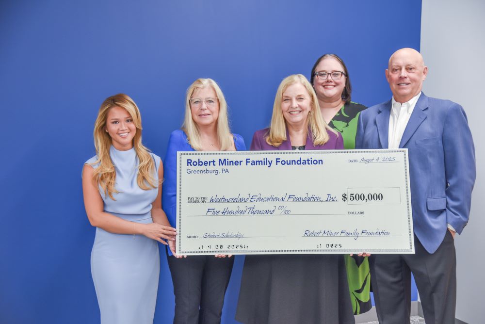 Miner Family Foundation presents check