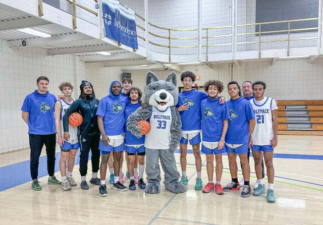 Westly with basketball players