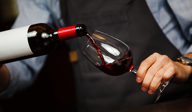 Pouring a glass of wine