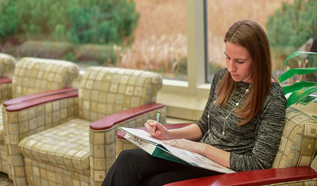 Student studying in Founders Hall