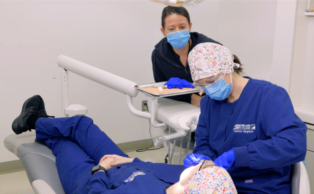 Dental Hygiene student and clinic patient