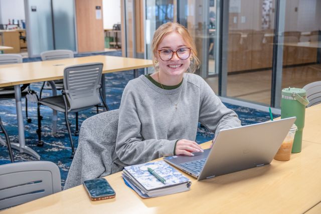 Female student at laptop