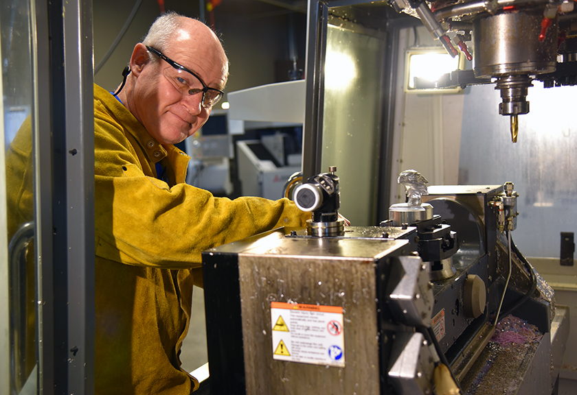 Dane Shultz inside the machine shop at the Advanced Technology Center