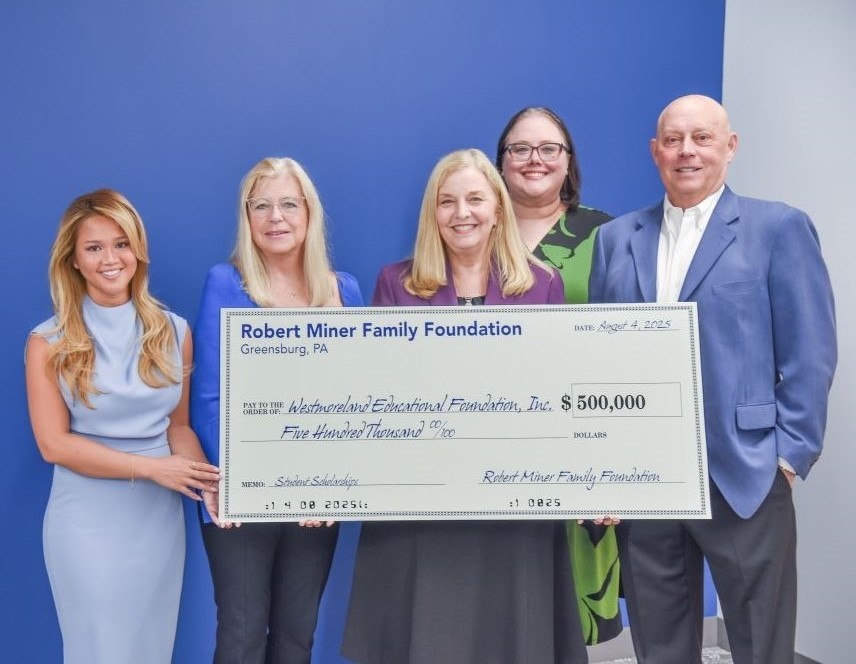 Miner Family Foundation presents check
